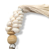Porte clés en petits coquillages blancs